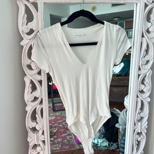 White v-neck bodysuit